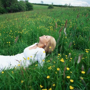 woman lying in field